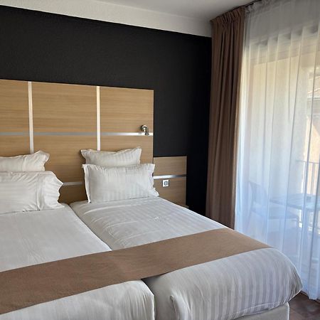 Cit'Hotel Le Chris'Tel Hotel Et Restaurant Le Puy-en-Velay Exterior photo