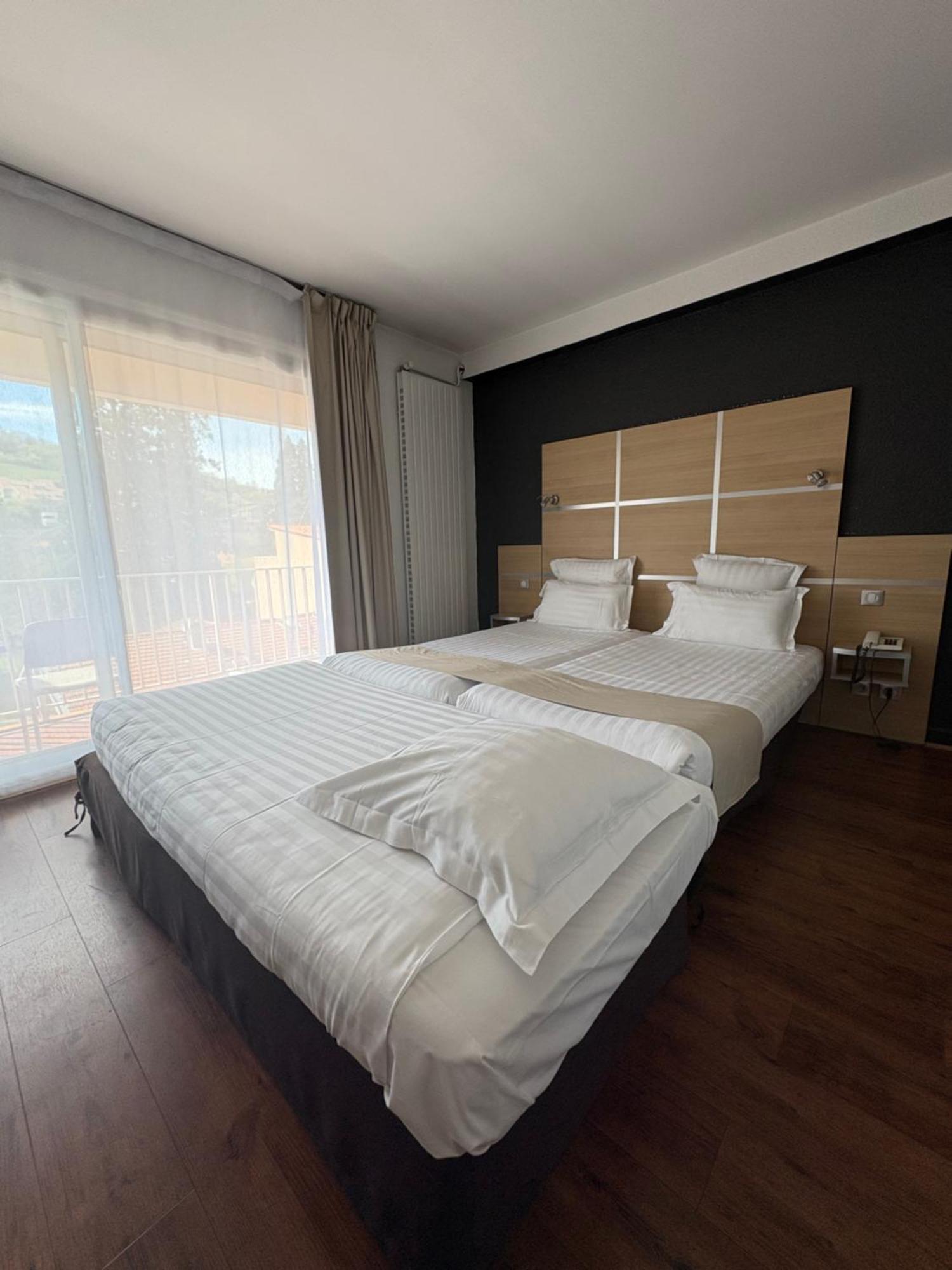 Cit'Hotel Le Chris'Tel Hotel Et Restaurant Le Puy-en-Velay Exterior photo